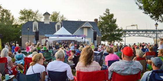 Group of adults with pretzels around their neck