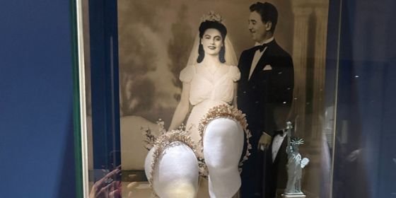 Kid looking in glass case at candy in Little York Confectionery