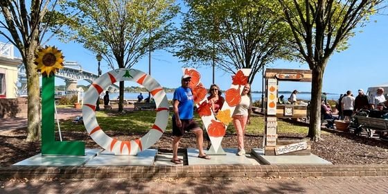 Group of adults with pretzels around their neck