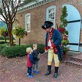 Interpreter with kids at the Yorktown Freight Shed