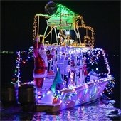 Lighted boat sailing on the York River