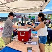 Group of adults dressed in green for St. Patrick's Day